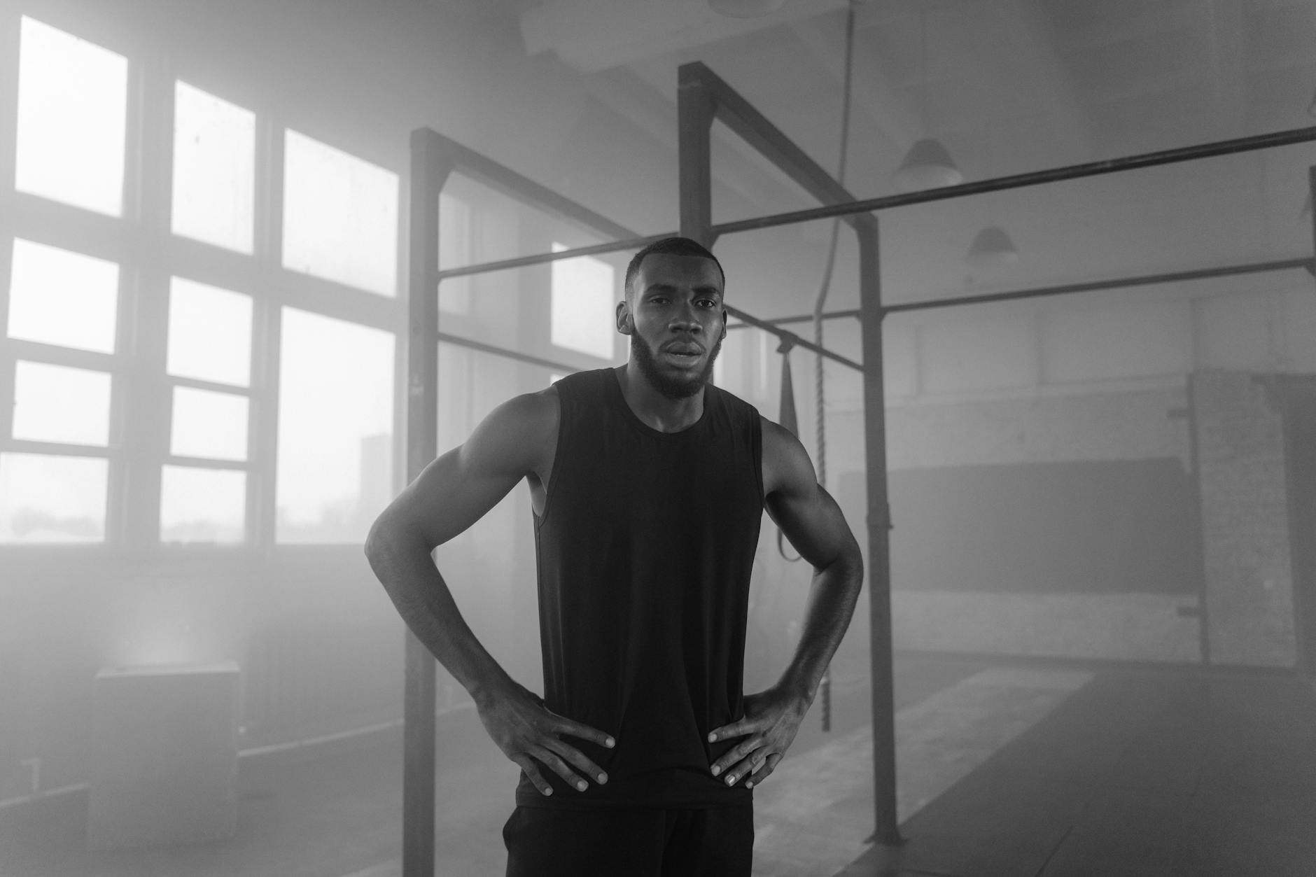 Instructor demonstrating posture and focus in a training studio setting